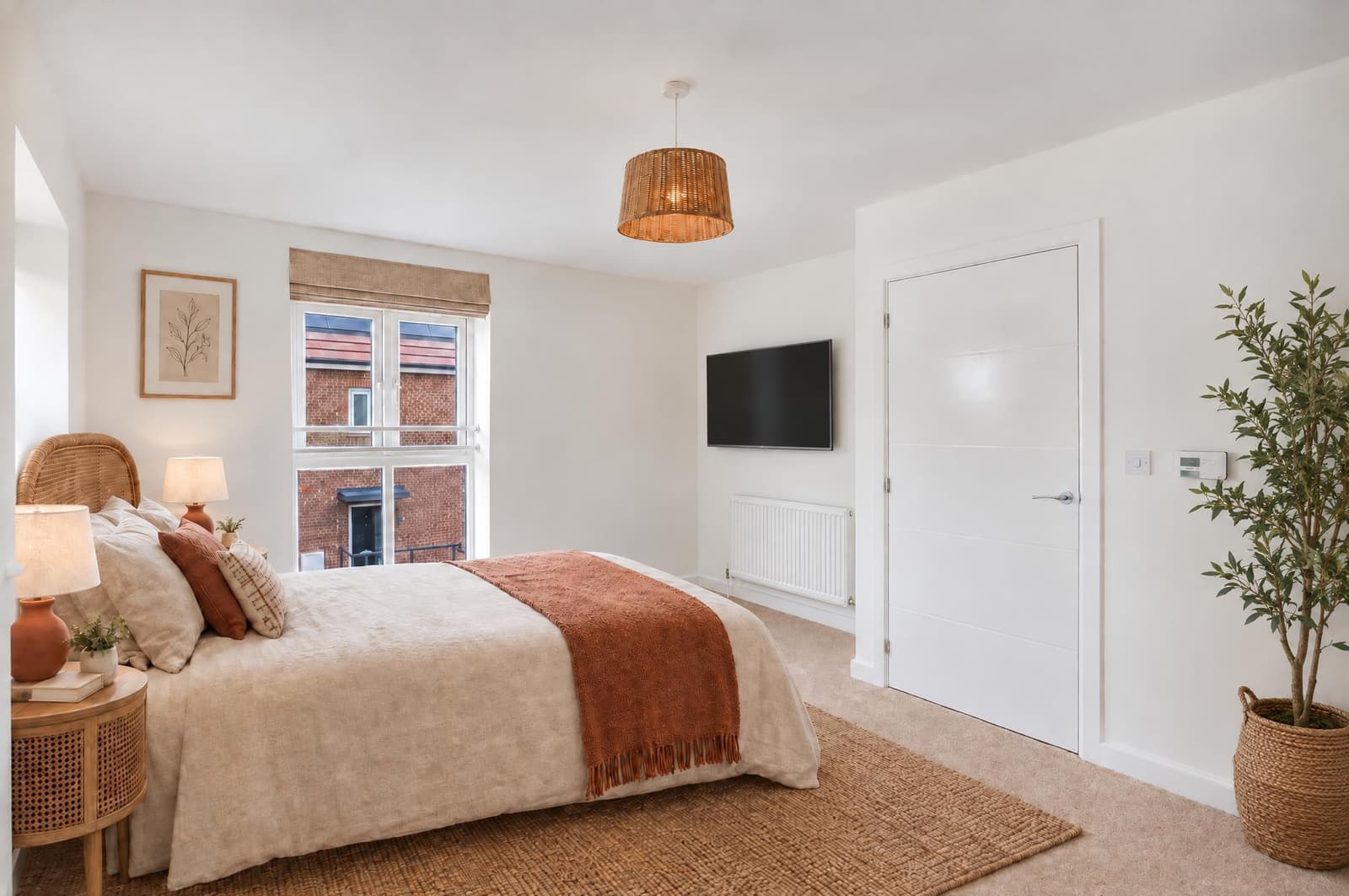 A staged bedroom with its window, radiator, door and ceiling light point highlighted as unchanged