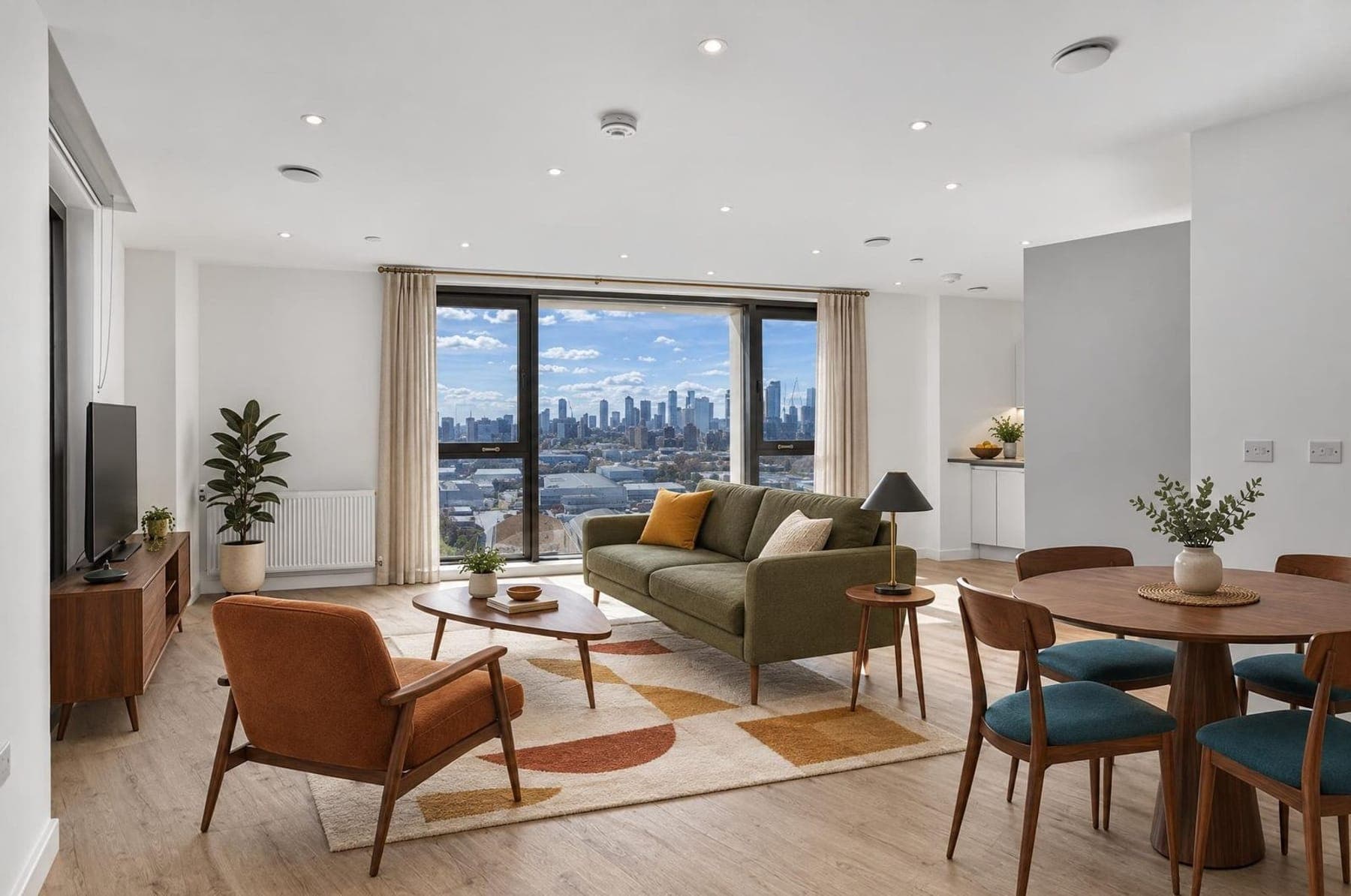 A staged open-plan living and dining room
